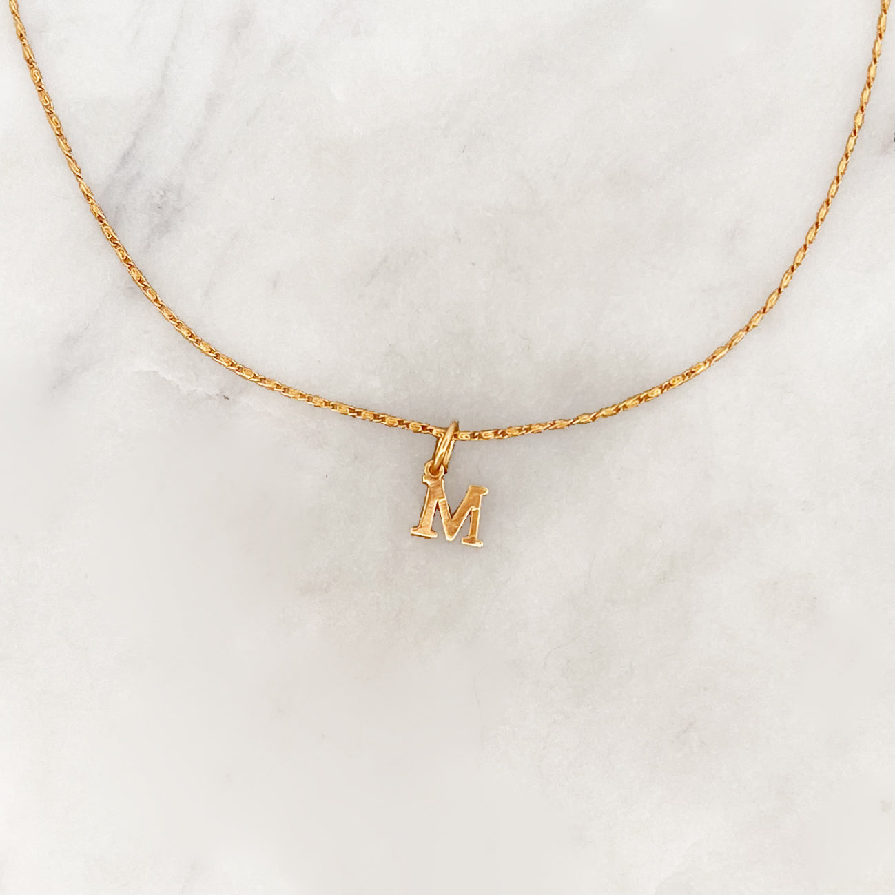Tiny Initial Charm Gold Necklace – CamillaLimon